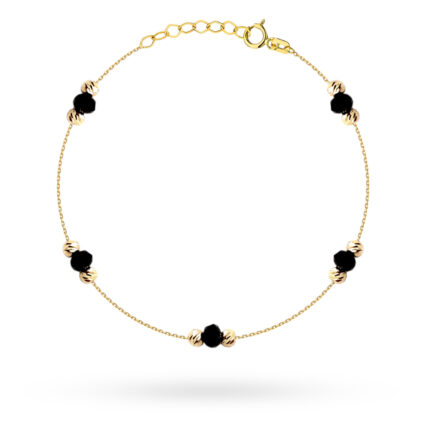 Złota bransoletka z czarnymi kamieniami